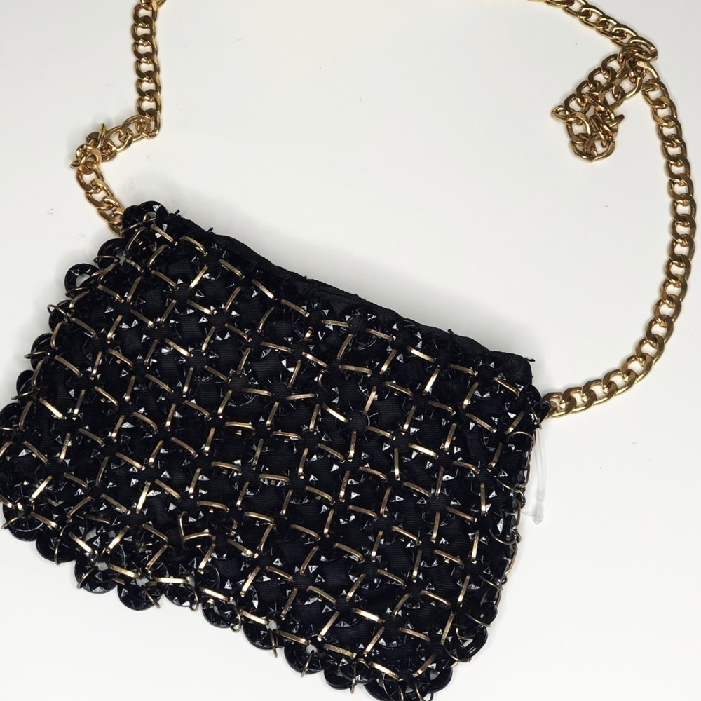 Free people mini metallic purse with gold strap.  NWOT